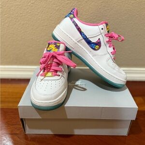 Stylist Pink, White, and Blue Nike Air Force 1